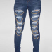 Trendy Mid Waist Broken Holes Metal Decoration Blue Denim Skinny Jeans