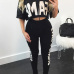 Leisure Round Neck Half Sleeves Letters Printed Black Milk Silk Two-piece Pants Set