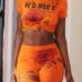 Leisure Round Neck Short Sleeves Printed Hollow-out Orange Polyester Two-piece Pants Set